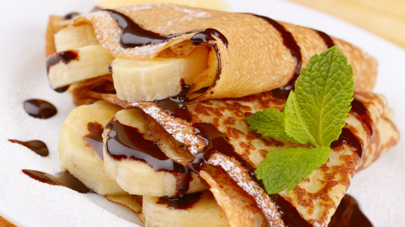 Cinnamon Pancakes with Bananas and Chocolate Sauce