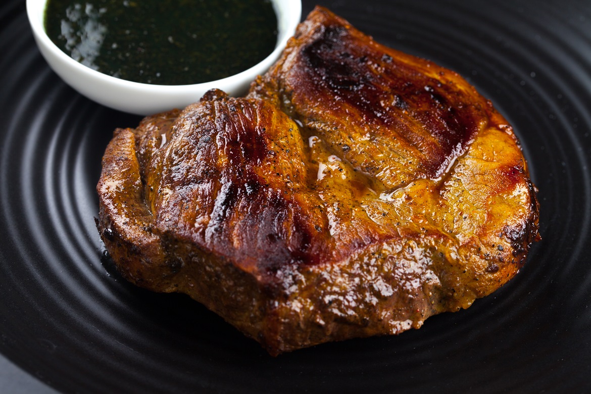 Roasted lamb with hot pepper and mint sauce