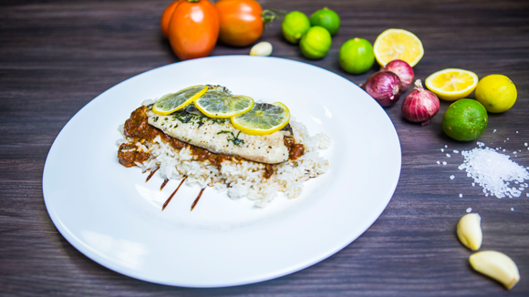 Foil Baked Tilapia in Swahili Spiced Passion-Tomato Sauce